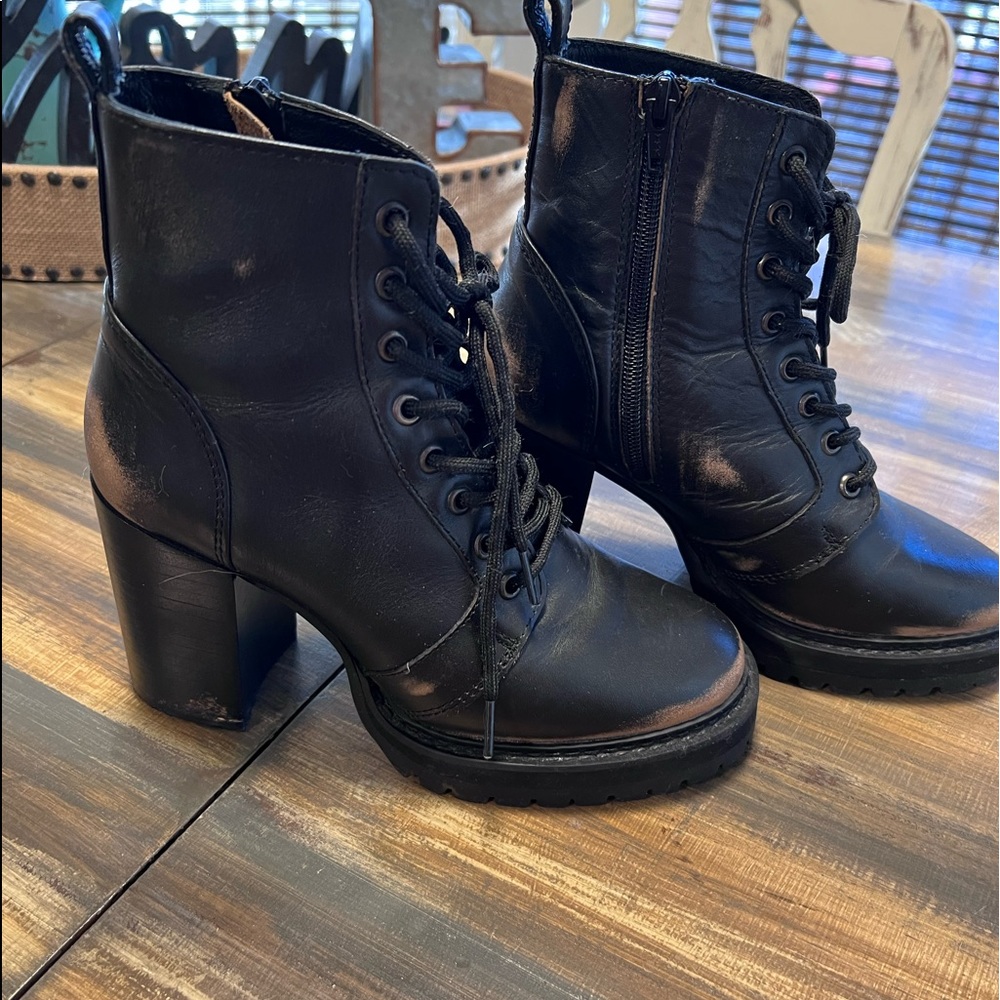 Steve Madden distressed combat boots: size 7.5 fits more like a 7. Looks new.
